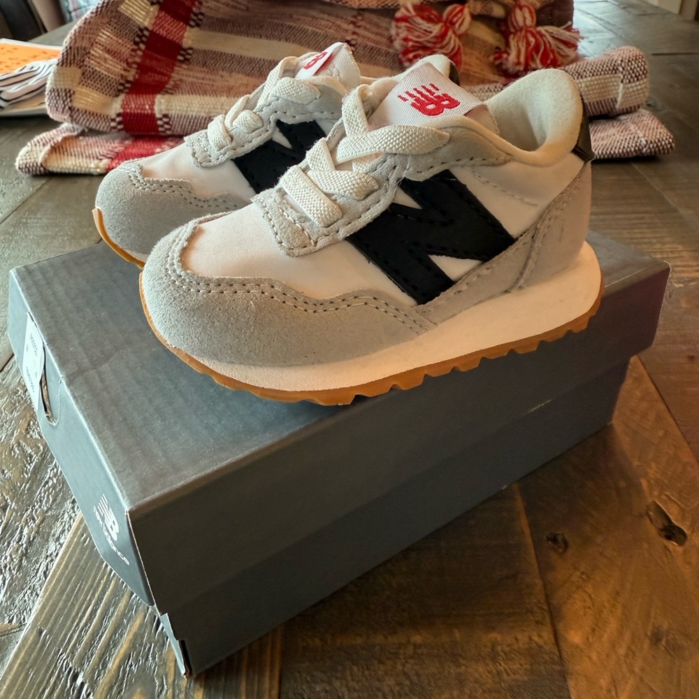 New Balance 237 White and Black Sneakers